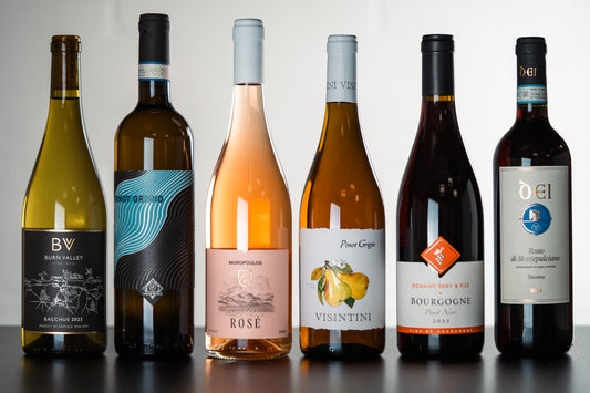 Six bottles of wine from the WINESLUT Pizza Party wine bundle displayed in a group shot.