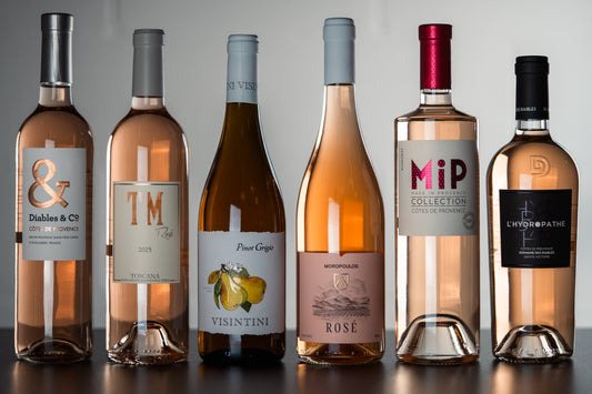 Six bottles of WINESLUT All Day Rosé wine bundle, featuring vibrant pink wine bottles arranged together.