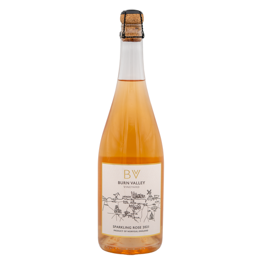 Bottle of Burn Valley Vineyard Sparkling Rosé sparkling wine with a pink label and foil top, showcasing elegant bubbles and a celebratory feel.