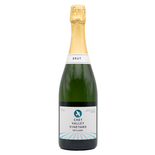 Chet Valley Skylark Brut Blanc de Blancs sparkling wine bottle with a clear label and foil top on a white background