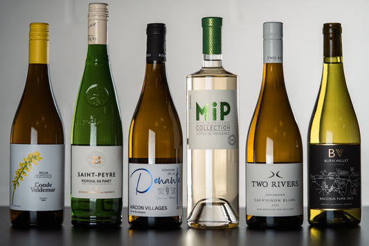 Six bottles of WINESLUT Whenever White wine in a bundle, with labels visible and bottles arranged together.